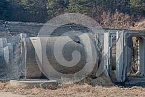 Concrete culverts on ground at new construction site