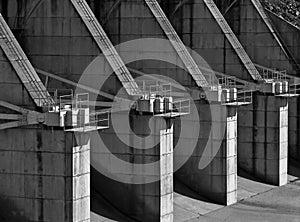 Concrete dam spillway flow control stations photo