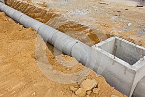 Concrete drainage tank on construction site