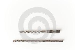 Concrete drill bits isolated on white. SDS hammer bit and drill concrete bit