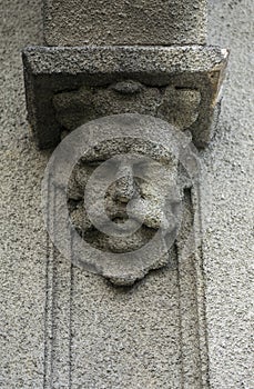 Concrete face on a wall