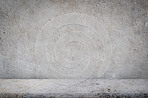 Concrete floor with empty grey concrete wall background