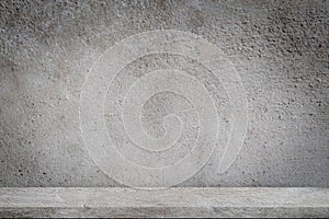 Concrete floor with empty grey concrete wall background