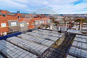 Concrete floor slab with rebars in a residential building under construction