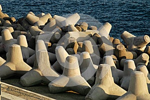 Concrete formations on the coast photo