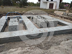 Concrete foundation for a house building. Real estate business