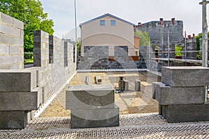 Concrete foundation of a new house, view of construction site in preparation process