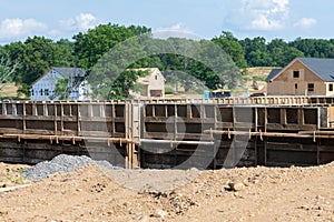 Concrete foundation with reinforcement and metal slab construction site, process of house building formwork for foundation new