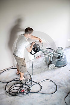 Concrete grinding in family home,construction works