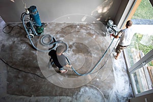 Concrete grinding in family home,construction works photo