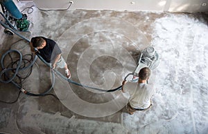 Concrete grinding in family home,construction works photo