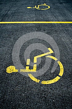 Concrete handicapped sign