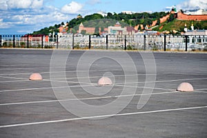 Concrete hemispheres parking limiter. Protection from car parking. Elements to restrict access to parking zone and control