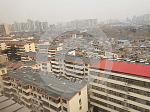 Concrete Jungle of Linyi City in China in Smog