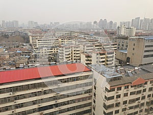 Concrete Jungle of Linyi City in China in Smog