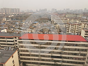 Concrete Jungle of Linyi City in China in Smog