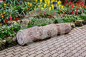 Concrete log bench style in the garden, Cement log bench style