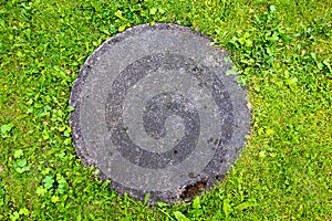 Concrete manhole cover