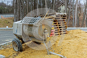 Concrete-mixer is left after working time at construction