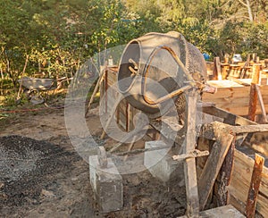 Concrete mixer near the formwork