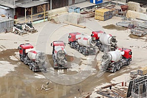 Concrete mixers, tractor, construction materials