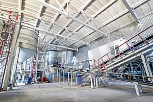 Concrete mixing tanks with transporter at factory