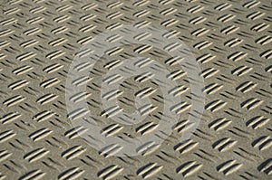 Concrete monolith staircase with the texture of extruded ribbed, corrugated sheet metal. ramp with vegetation of ornamental dry gr