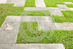 Concrete pavement on grass