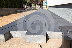 Concrete paver blocks laid near the house