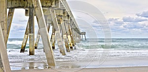 Concrete Pier Reaching Out Into the Sea