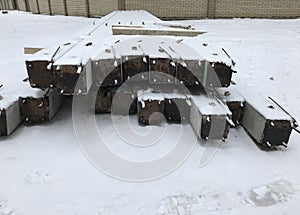 Concrete pillars on the streets of Ukraine under snow