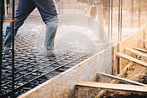 Concrete pouring during commercial concreting floors of building