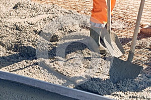 Concrete pouring during commercial concreting floors of building