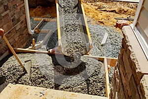 Concrete pouring during commercial concreting floors building