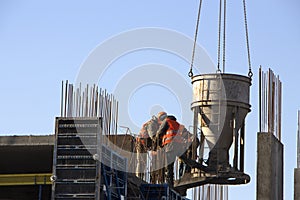 Concrete pouring during commercial concreting floors of building in construction site and Civil Engineer