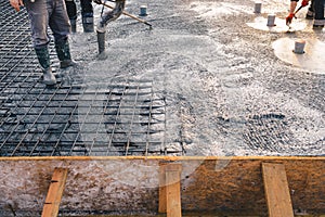 Concrete pouring during concreting floors of buildings in construction