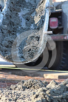 Concrete pouring down the chute