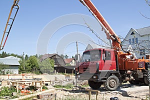 concrete pump on the site counstruction of foudation slab