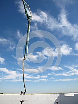 Concrete pumper and sky scape.