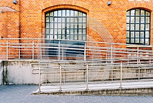 Concrete ramp way with stainless steel handrail