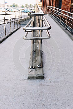 Concrete ramp way with stainless steel handrail