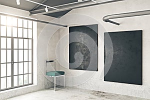 Concrete room with two chalkboards