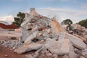 The concrete rubble remains of a building photo