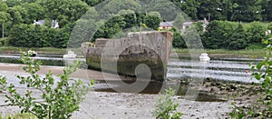 Concrete Ship on River