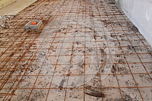 Concrete slab paving on hollow core slab flooring construction site