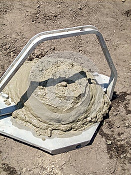 Concrete slump test  from cone to determine workability