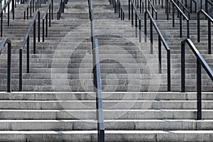 Concrete staircase with iron railings