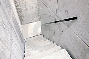 Concrete staircase and stairs leading down