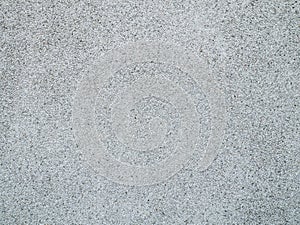 Concrete stone pebbles wall background texture.