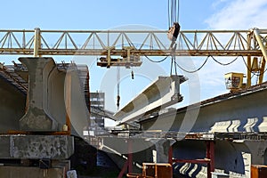 The concrete structure raise the crane on blue sky background